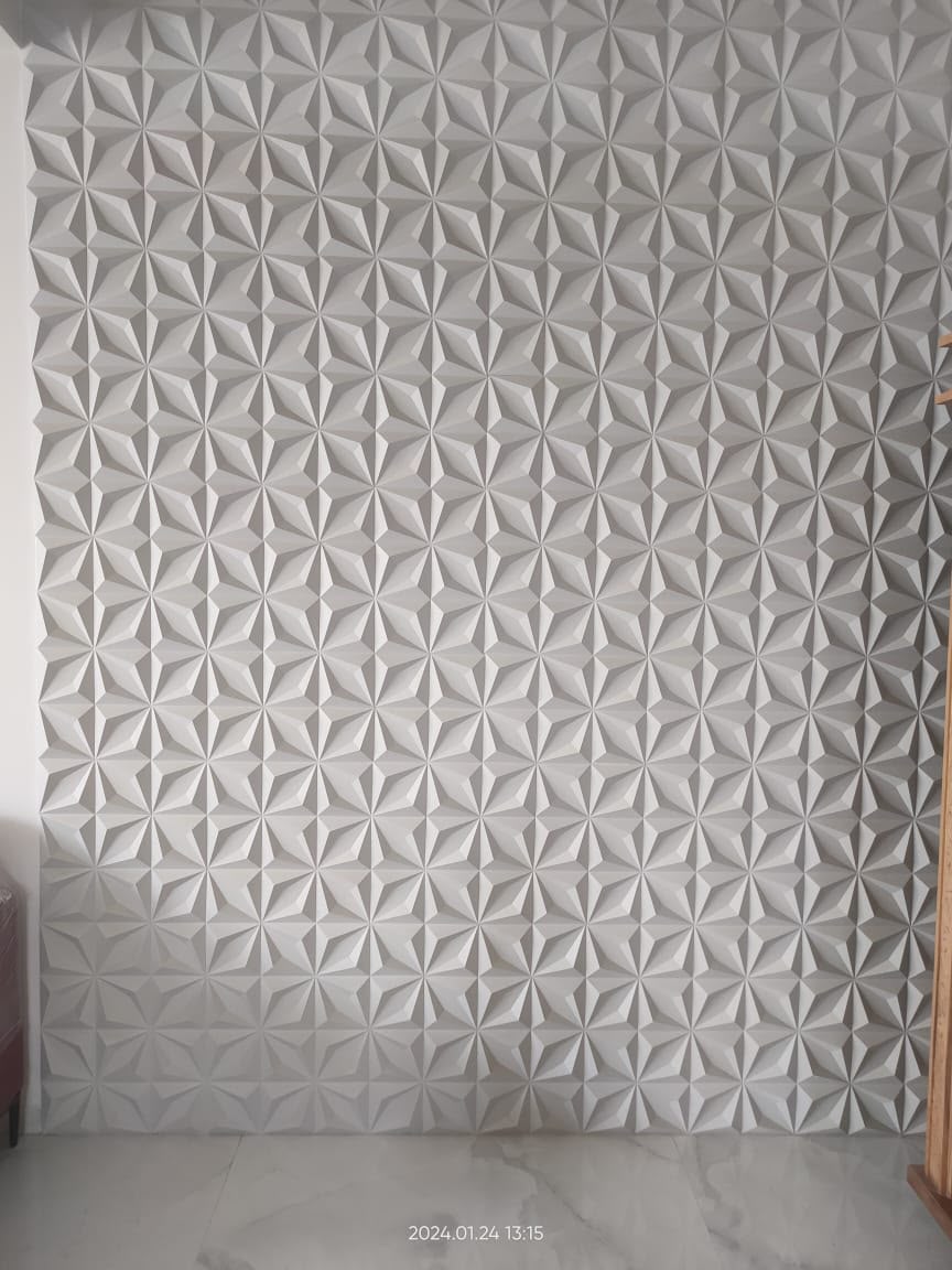 Interior feature wall fully clad in star-pattern panels
